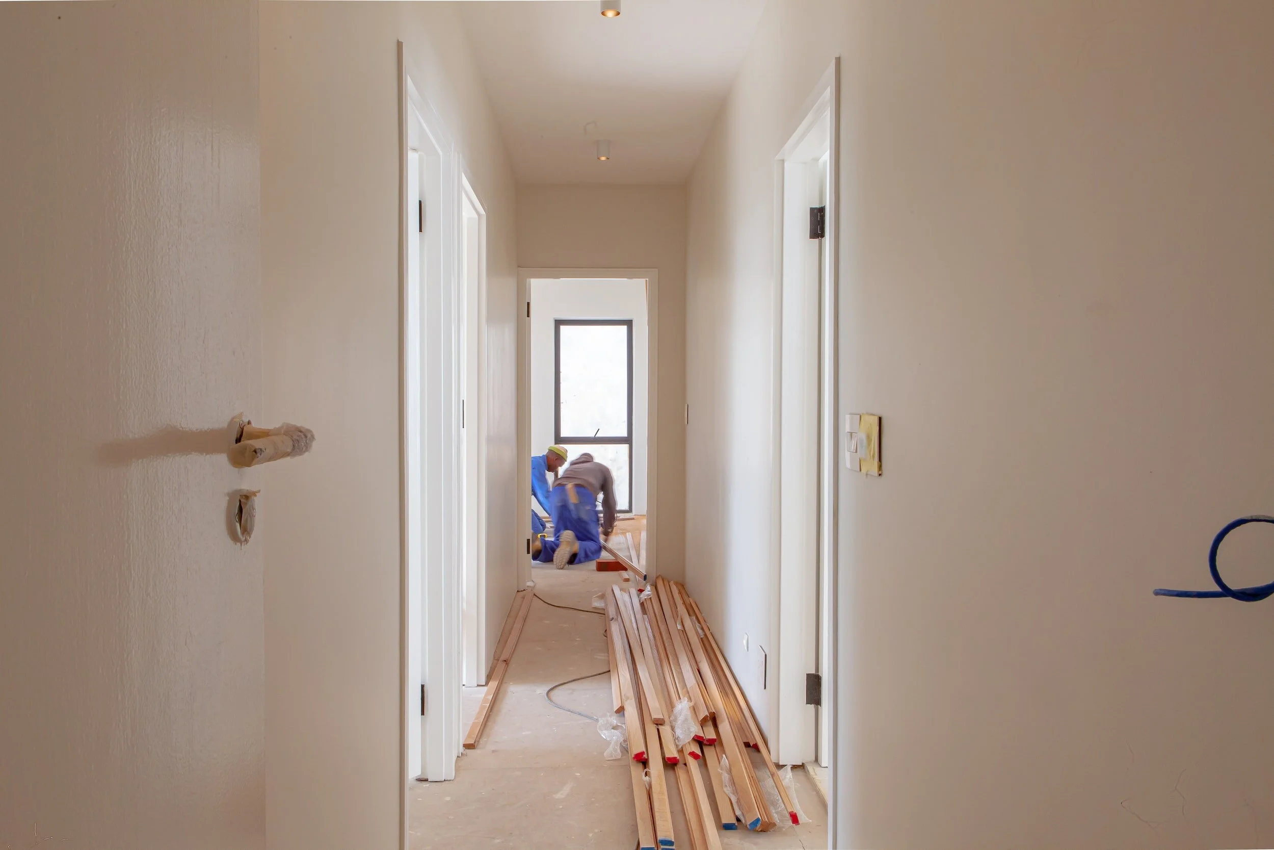 Renovation in progress with fresh framing and natural light